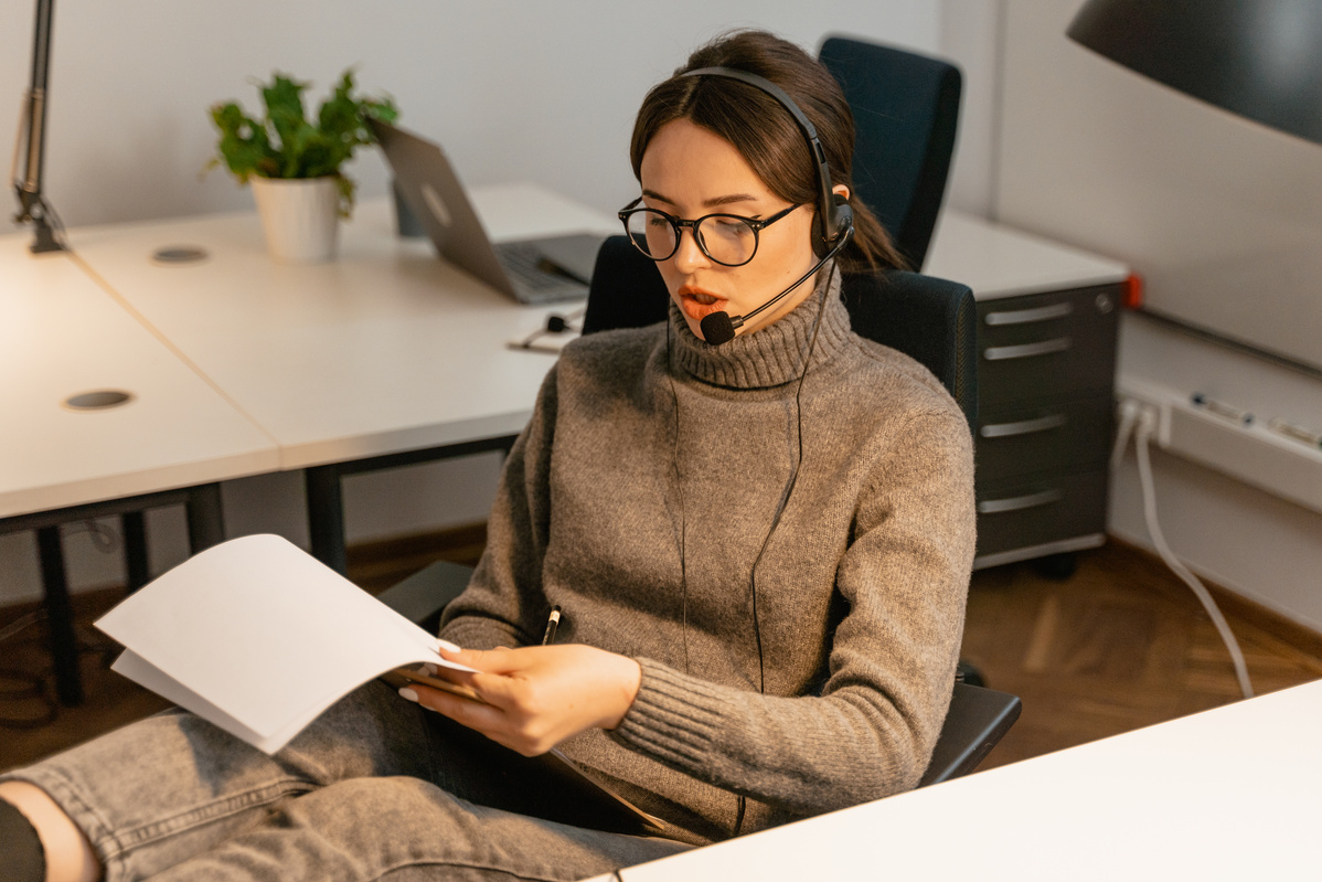 A Woman Working as a Customer Support 